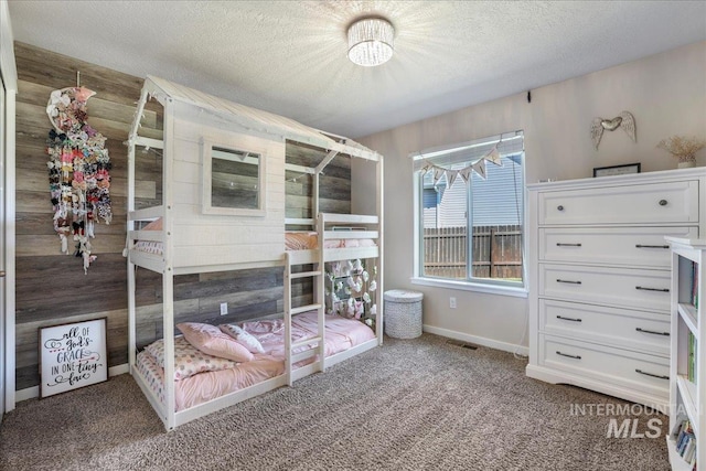 614 Ethan Ct, Jerome, ID 83338 - carpeted bedroom featuring a textured ceiling and baseboards
