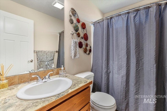 614 Ethan Ct, Jerome, ID 83338 - full bathroom featuring toilet and vanity
