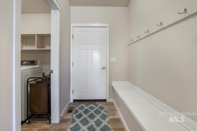 614 Ethan Ct, Jerome, ID 83338 - mudroom featuring washer / clothes dryer and baseboards