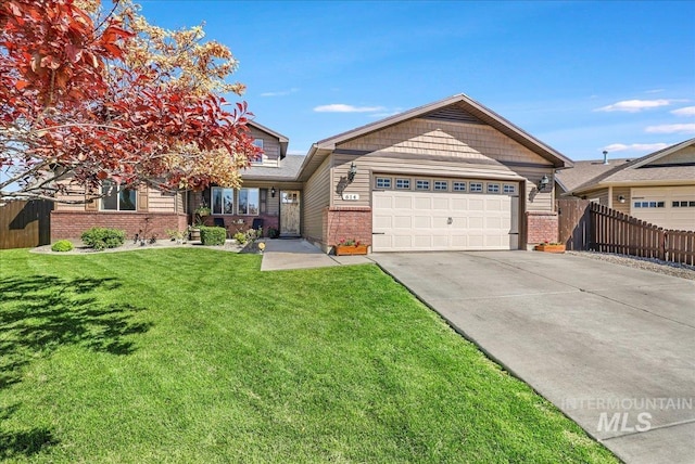 614 Ethan Ct, Jerome, ID 83338 - view of front of property with concrete driveway, brick siding, and an attached garage