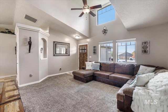 614 Ethan Ct, Jerome, ID 83338 - living room featuring a ceiling fan, baseboards, carpet floors, and a high ceiling