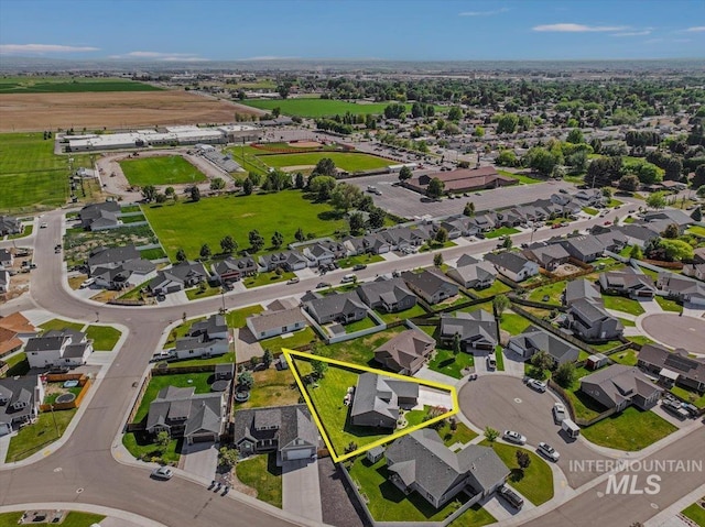 614 Ethan Ct, Jerome, ID 83338 - aerial view of property and surrounding area featuring property parcel outlined and nearby suburban area