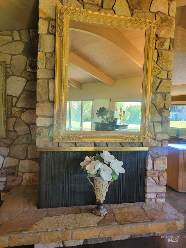 708 16th St, Clarkston, WA 99403 - detailed view of a wooden ceiling with exposed beams and a stone fireplace