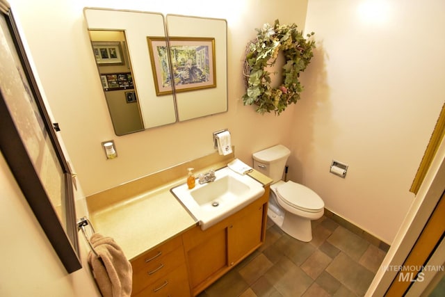708 16th St, Clarkston, WA 99403 - bathroom featuring vanity and toilet