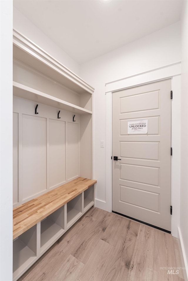 1246 E Rio Chico Dr, Kuna, ID 83634 - mudroom with wood finished floors and baseboards