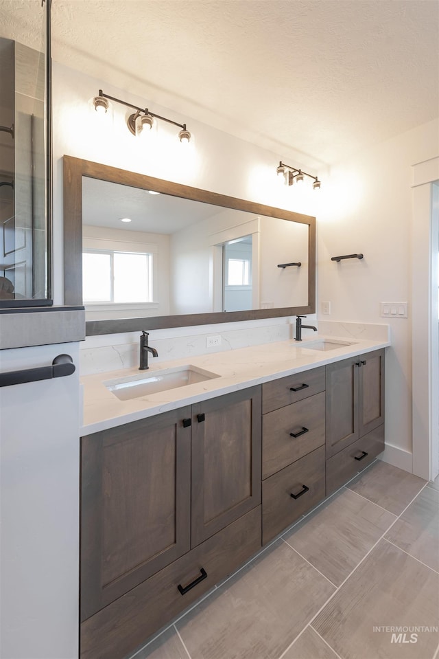 1246 E Rio Chico Dr, Kuna, ID 83634 - bathroom featuring double vanity