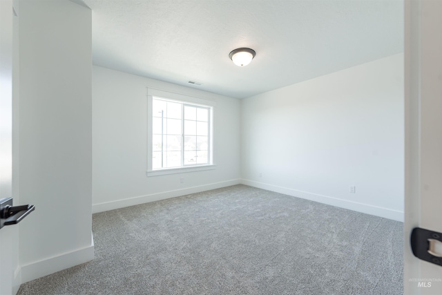 1246 E Rio Chico Dr, Kuna, ID 83634 - carpeted spare room with baseboards