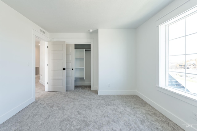 1246 E Rio Chico Dr, Kuna, ID 83634 - unfurnished bedroom featuring carpet floors, baseboards, and a closet