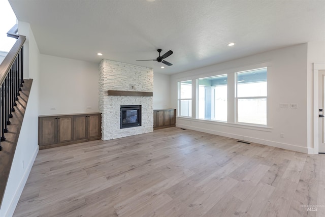 1246 E Rio Chico Dr, Kuna, ID 83634 - unfurnished living room featuring ceiling fan, light wood finished floors, baseboards, and recessed lighting