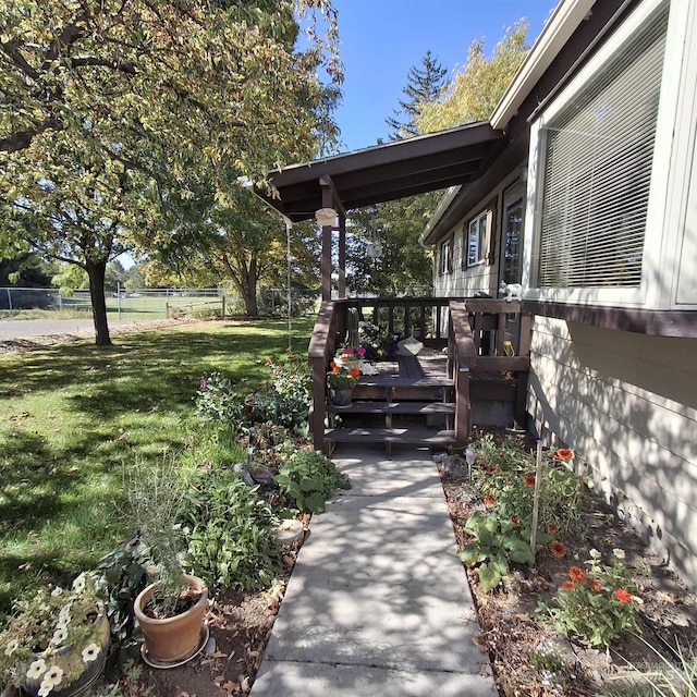 view of yard with a deck