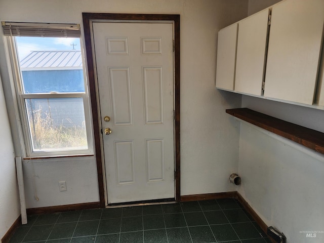 laundry room with cabinets