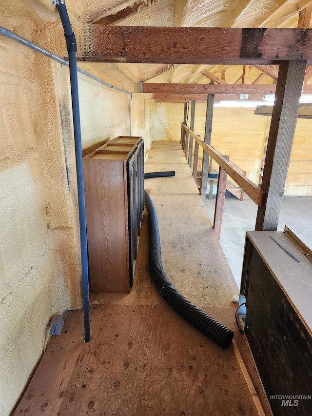 basement featuring hardwood / wood-style floors