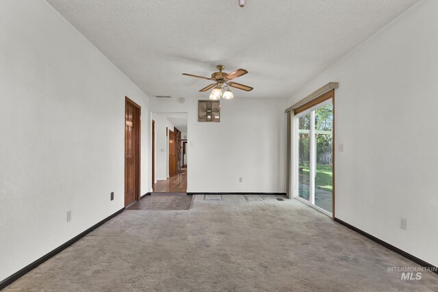 204 Hilldrop St, Caldwell, ID 83605 - carpeted empty room with a textured ceiling, a ceiling fan, and baseboards