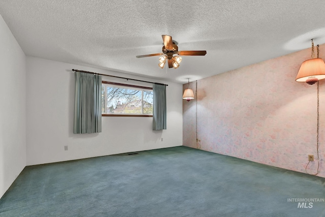 204 Hilldrop St, Caldwell, ID 83605 - carpeted empty room with visible vents, a textured ceiling, and ceiling fan