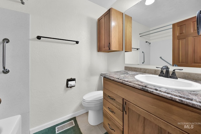204 Hilldrop St, Caldwell, ID 83605 - full bathroom with tile patterned floors, visible vents, toilet, vanity, and baseboards