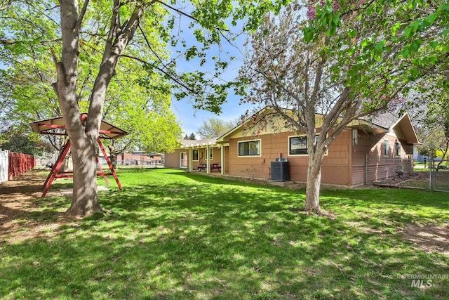 204 Hilldrop St, Caldwell, ID 83605 - view of yard featuring a fenced backyard and central AC unit