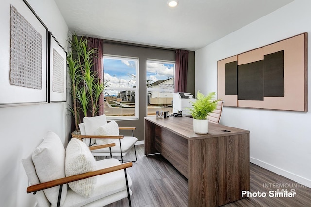 office featuring baseboards, dark wood finished floors, and recessed lighting