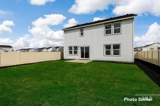 back of house with a patio area