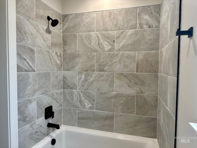 full bathroom with shower / washtub combination