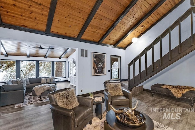 living room with hardwood / wood-style floors, wood ceiling, and beamed ceiling