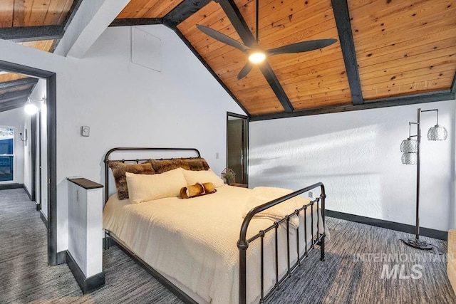 bedroom with lofted ceiling with beams, dark carpet, ceiling fan, and wooden ceiling