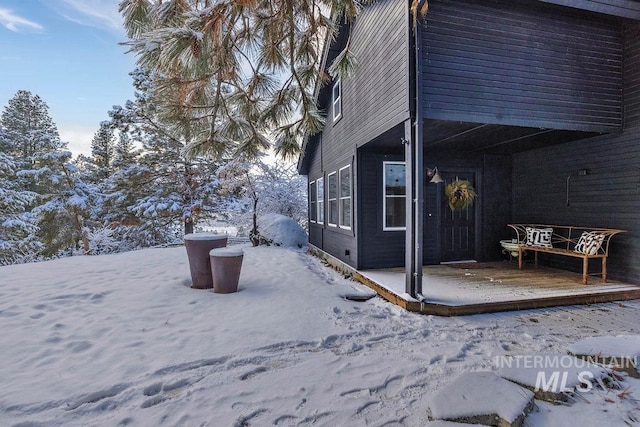 view of snow covered property