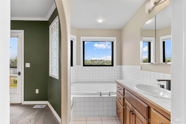 3224 Meadowlark, Lewiston, ID 83501 - full bath featuring a bath, vanity, baseboards, ornamental molding, and tile patterned floors