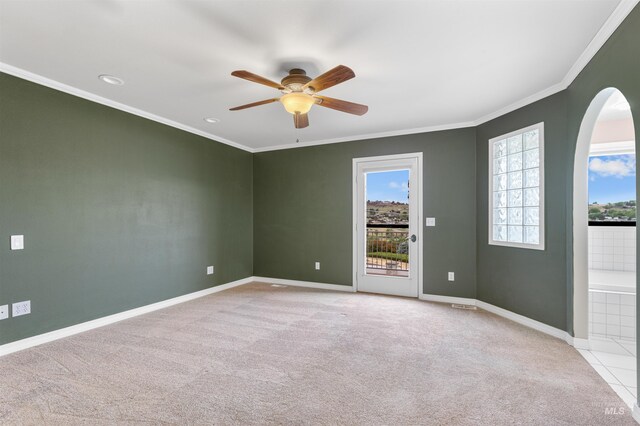 3224 Meadowlark, Lewiston, ID 83501 - carpeted empty room featuring a ceiling fan, baseboards, crown molding, arched walkways, and recessed lighting