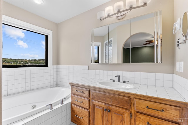 3224 Meadowlark, Lewiston, ID 83501 - full bathroom featuring a whirlpool tub, vanity, and ceiling fan