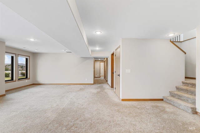 3224 Meadowlark, Lewiston, ID 83501 - below grade area with light carpet, baseboards, stairs, and recessed lighting