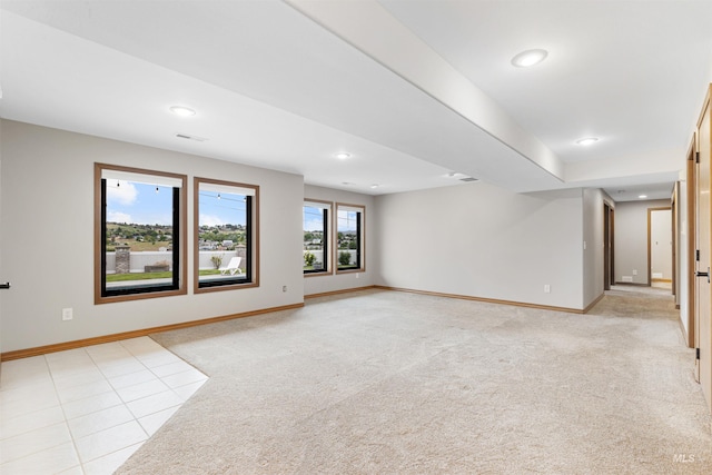 3224 Meadowlark, Lewiston, ID 83501 - spare room with baseboards, light colored carpet, recessed lighting, and light tile patterned flooring