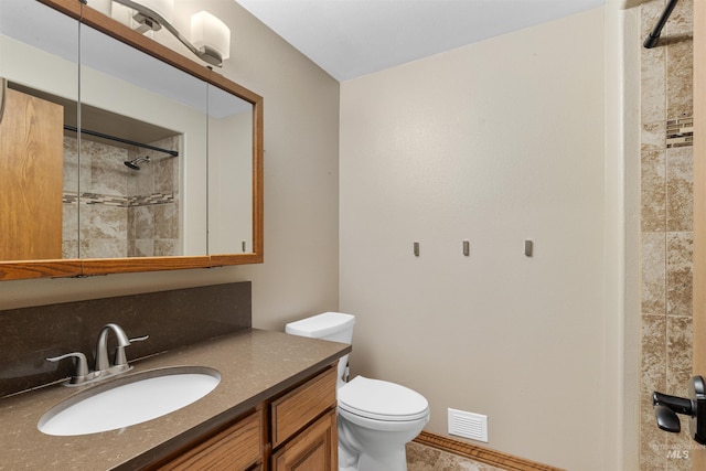3224 Meadowlark, Lewiston, ID 83501 - full bath featuring toilet, a tile shower, and vanity