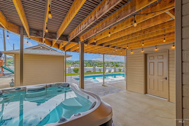 3224 Meadowlark, Lewiston, ID 83501 - view of swimming pool with a hot tub and a patio