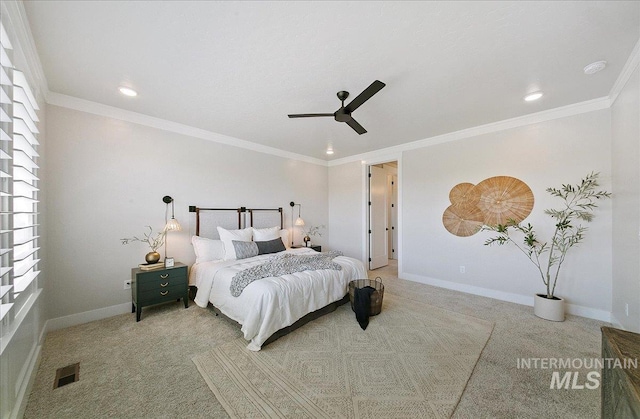 carpeted bedroom featuring recessed lighting, a ceiling fan, and ornamental molding