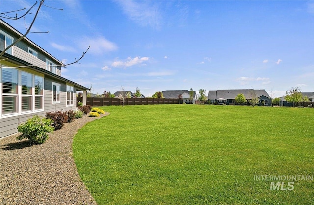 view of yard featuring fence