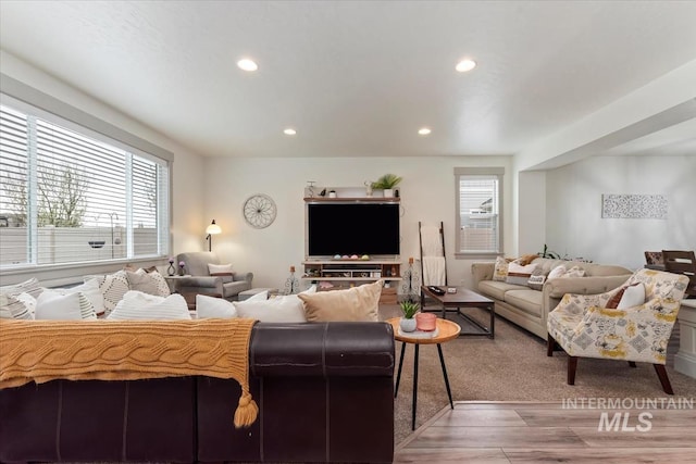 living room featuring recessed lighting and wood finished floors