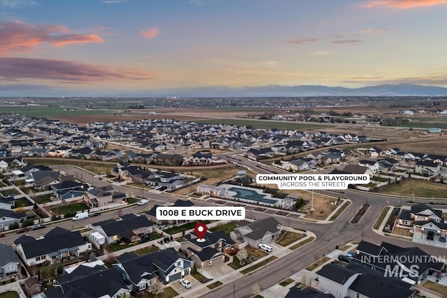 aerial view with a residential view and a mountain view