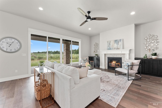 6536 W Flathead Lake St, Eagle, ID 83616 - living room with wood finished floors, recessed lighting, a ceiling fan, and a fireplace