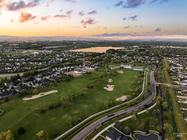 6536 W Flathead Lake St, Eagle, ID 83616 - aerial view at dusk of a residential view, a water and mountain view, and view of golf course