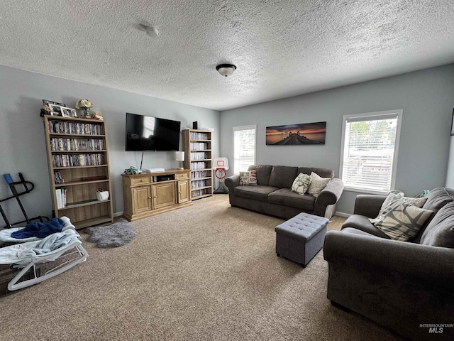 713 California St, Gooding, ID 83330 - carpeted living area featuring a textured ceiling and baseboards