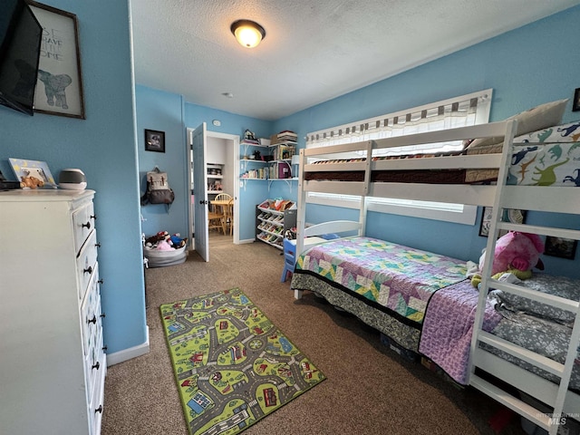 713 California St, Gooding, ID 83330 - carpeted bedroom with a textured ceiling