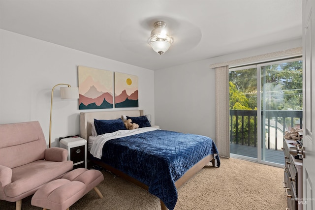 bedroom with carpet flooring and access to exterior