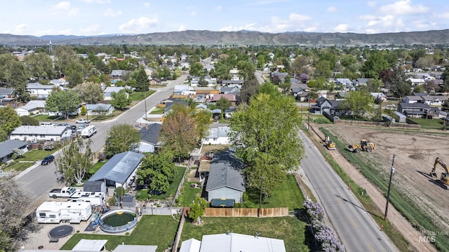 bird's eye view with a residential view and a mountain view
