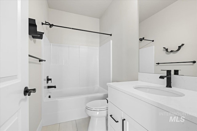 2187 E Hidcote St, Meridian, ID 83642 - bathroom with vanity, toilet, shower / washtub combination, and tile patterned flooring