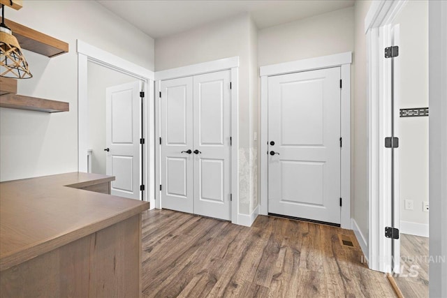 2187 E Hidcote St, Meridian, ID 83642 - hall featuring wood finished floors and baseboards