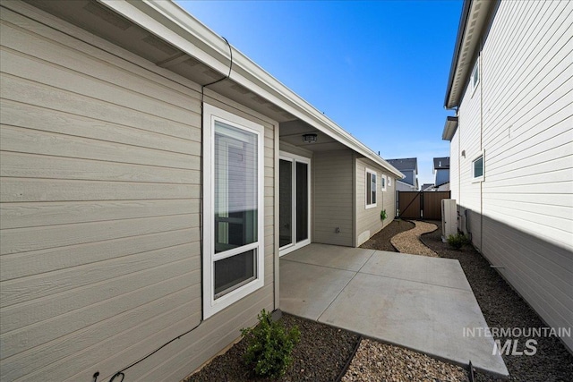 2187 E Hidcote St, Meridian, ID 83642 - view of home's exterior with a patio area and a gate