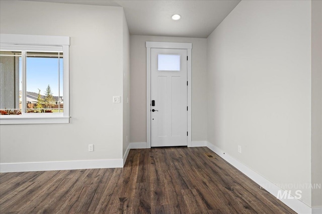 2187 E Hidcote St, Meridian, ID 83642 - foyer featuring dark wood-style flooring, baseboards, and recessed lighting