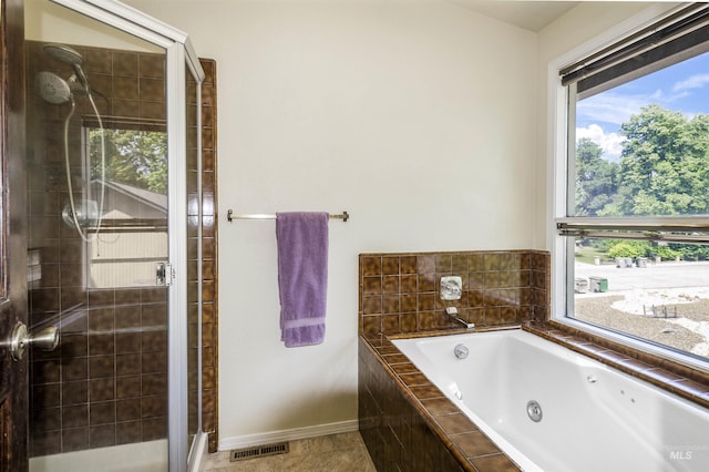 3344 N Tumbleweed, Boise, ID 83713 - full bathroom featuring a shower stall, a jetted tub, baseboards, and tile patterned floors