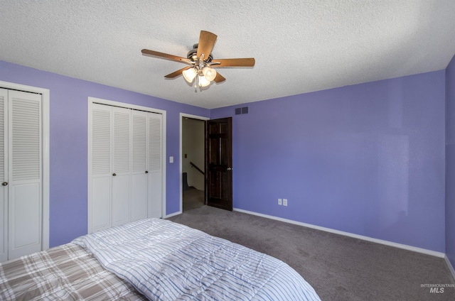 3344 N Tumbleweed, Boise, ID 83713 - bedroom featuring carpet flooring, baseboards, multiple closets, a textured ceiling, and a ceiling fan