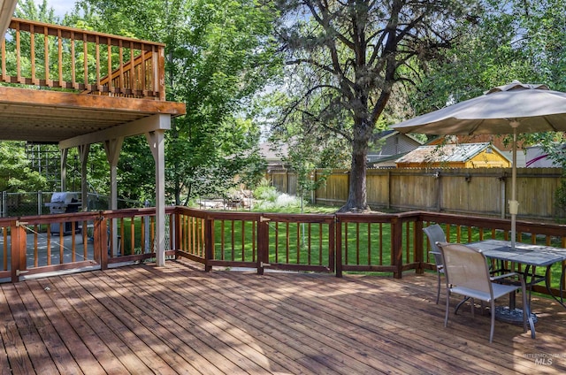 3344 N Tumbleweed, Boise, ID 83713 - wooden terrace with a fenced backyard and outdoor dining area